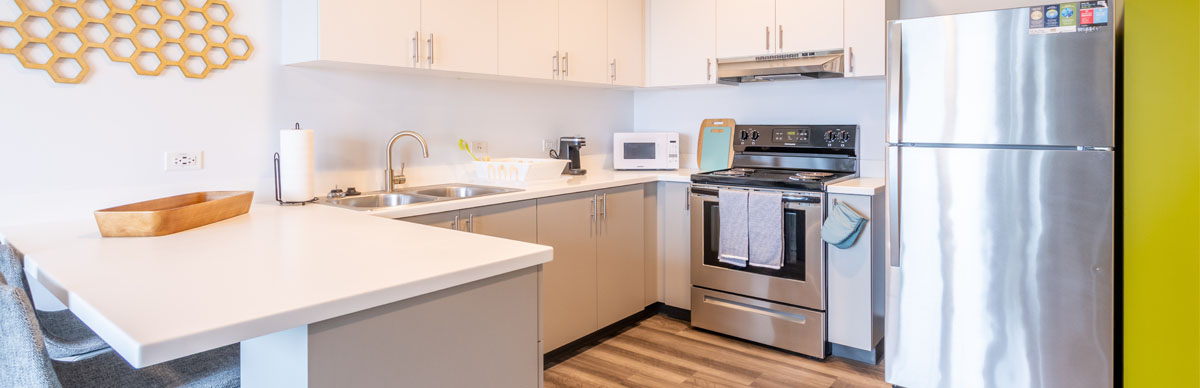 2 of 5, Nuevo East Guest Suite Kitchen